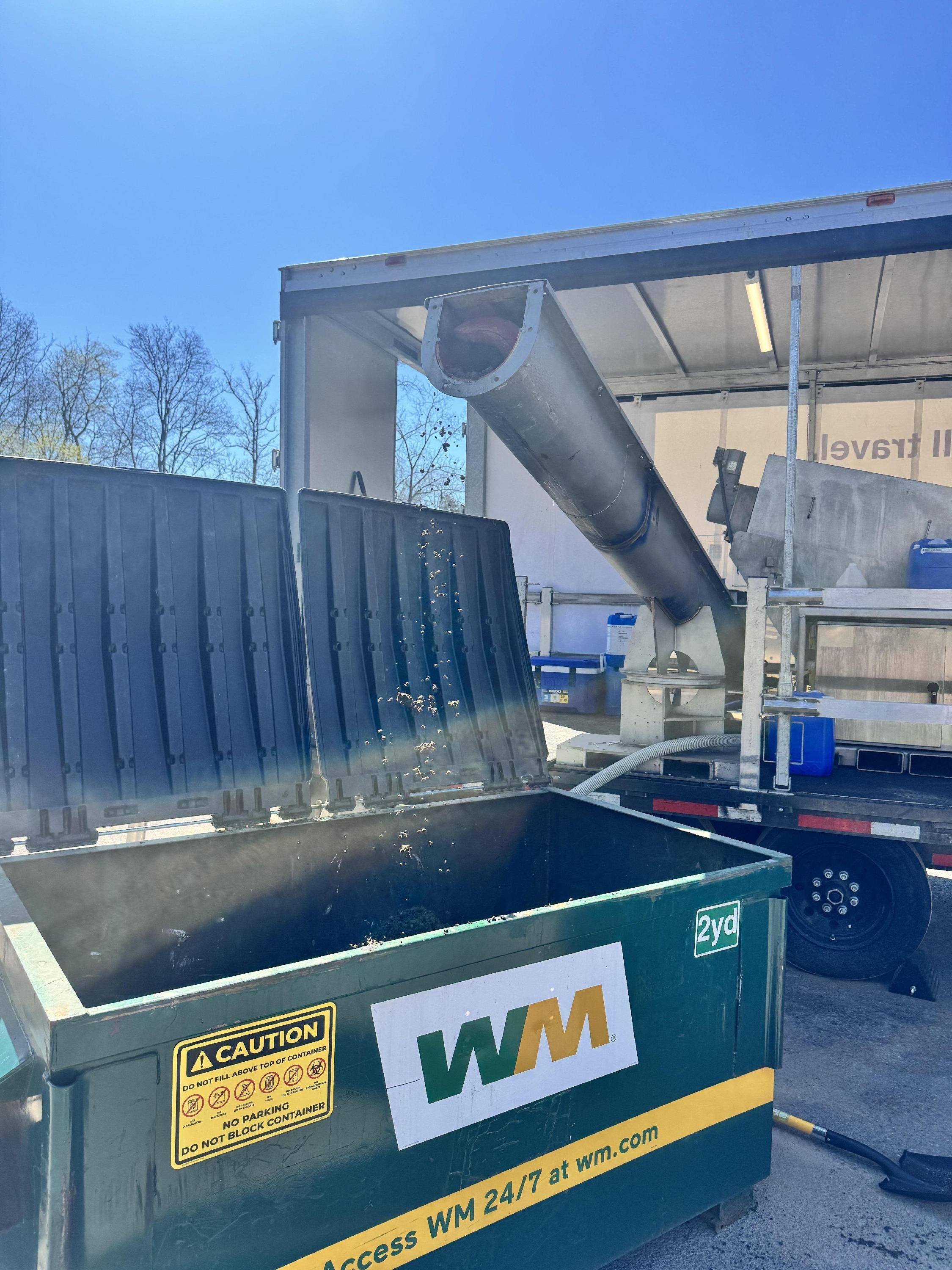 finished-product-into-dumpster